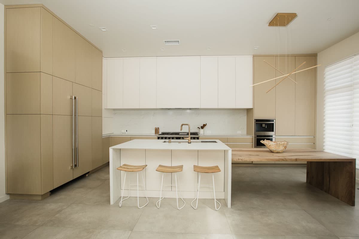 Light-oak and cream contemporary kitchen built by AV’s Cabinets